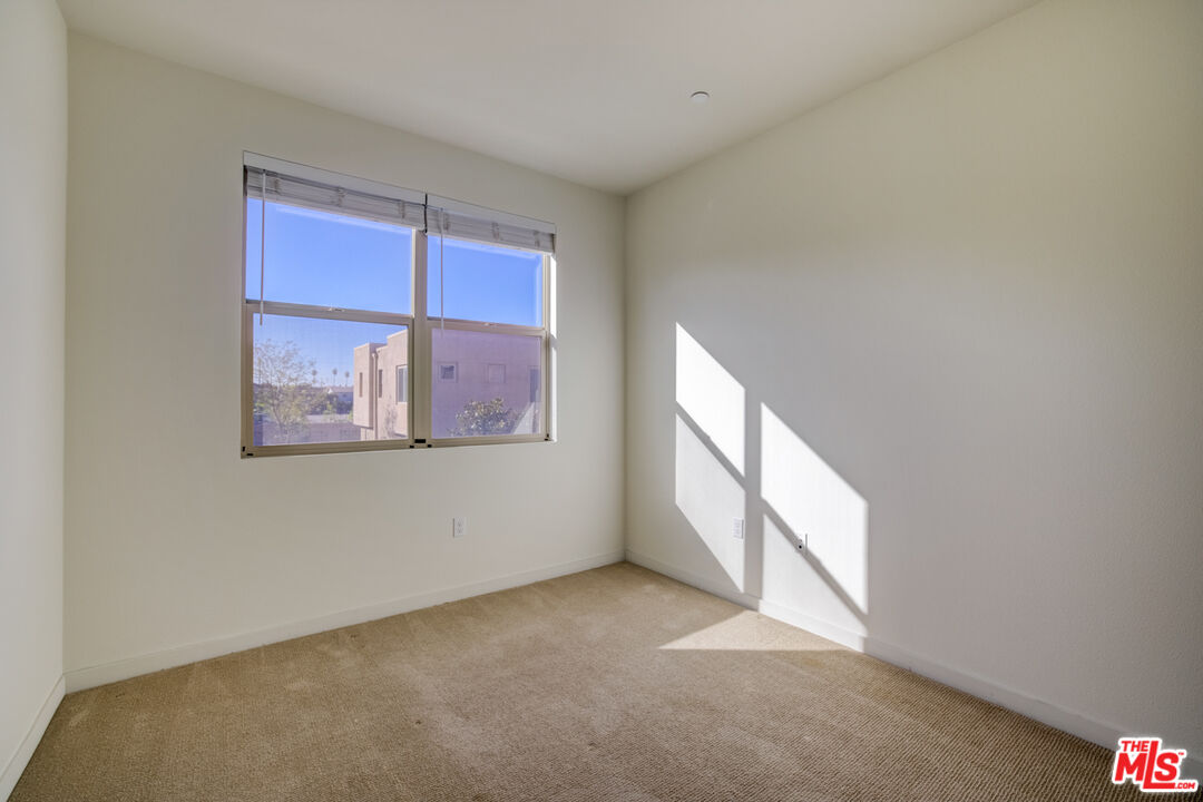 694 Colorado Circle Carson, CA 90745 - Photo 29 of 37 a view of an empty room with a window