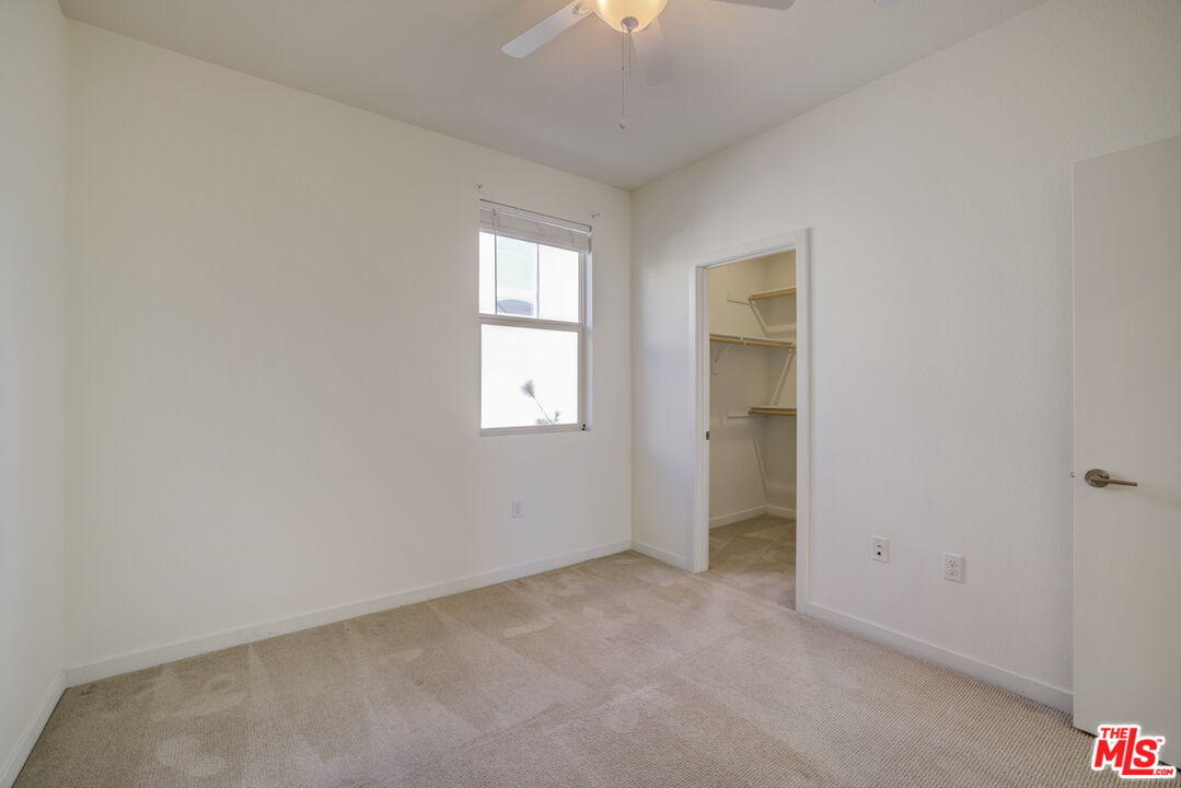 694 Colorado Circle Carson, CA 90745 - Photo 32 of 37 an empty room with windows and closet