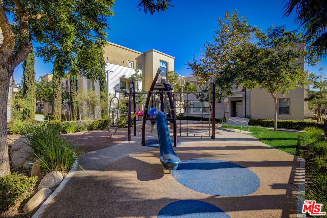 694 Colorado Circle Carson, CA 90745 - Photo 35 of 37 a park view with a fountain plants and palm tree