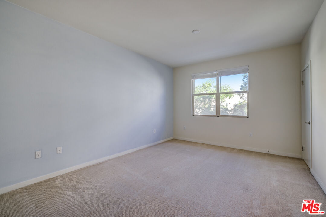 694 Colorado Circle Carson, CA 90745 - Photo 7 of 37 an empty room with windows