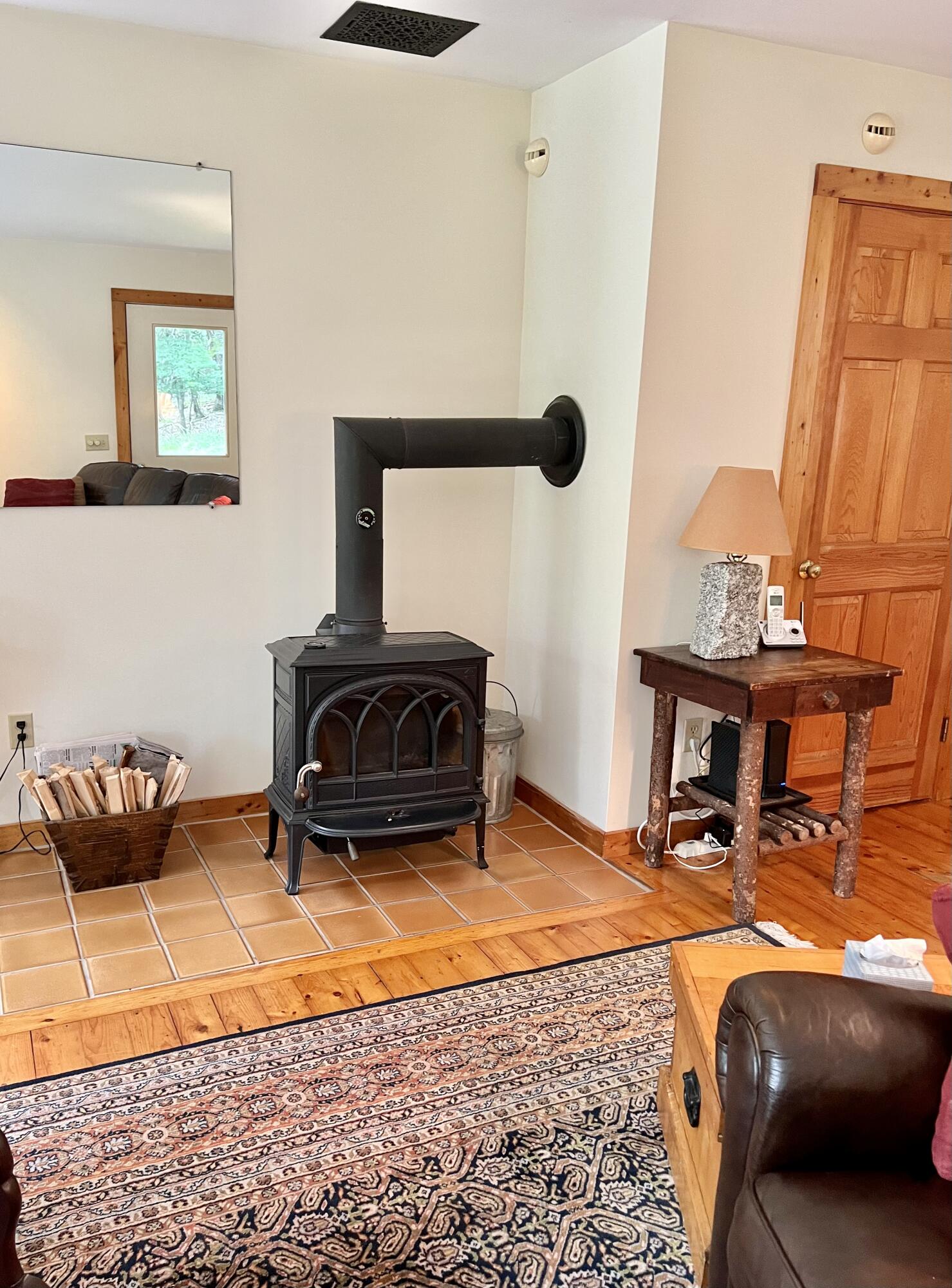 7 Cobbles End Mount Desert, ME 04660 - Photo 13 of 40 Wood stove in living room