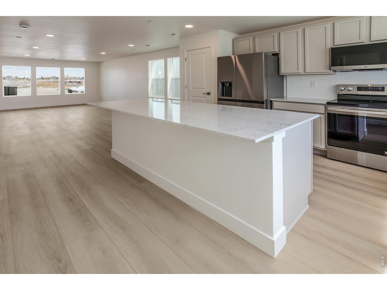 3255 Comet Street Fort Collins, CO 80524 - Photo 10 of 40 KITCHEN OPEN TO DINING AND LIVING