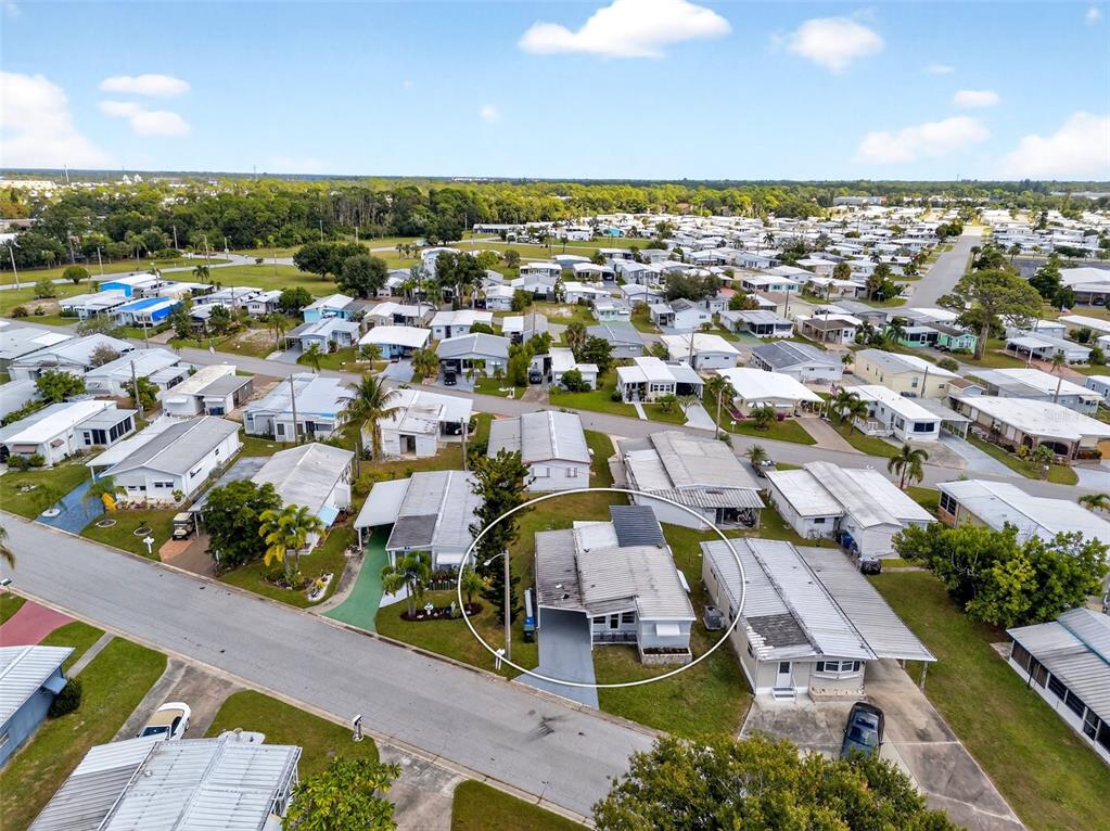 5162 Boca Raton Avenue Sarasota, FL 34234 - Photo 30 of 42 an aerial view of residential houses with outdoor space and ocean view