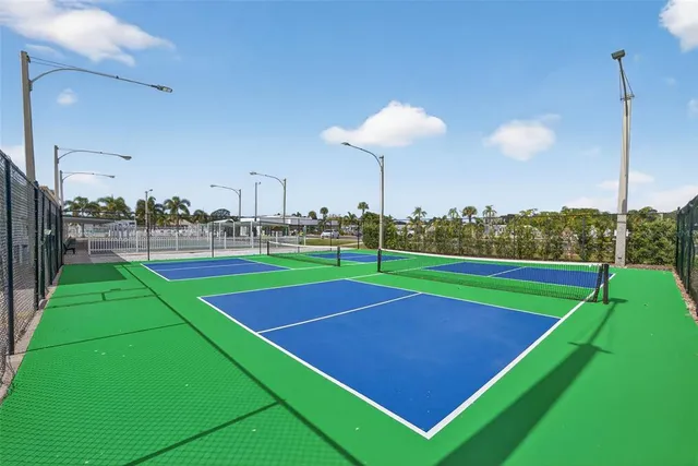 a front view of a house with potted plants