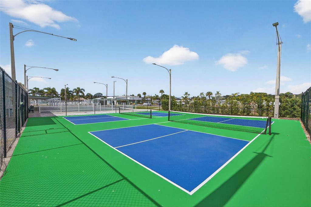 5162 Boca Raton Avenue Sarasota, FL 34234 - Photo 34 of 42 a view of a tennis court