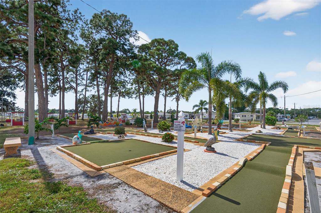 5162 Boca Raton Avenue Sarasota, FL 34234 - Photo 37 of 42 a view of a patio with swimming pool