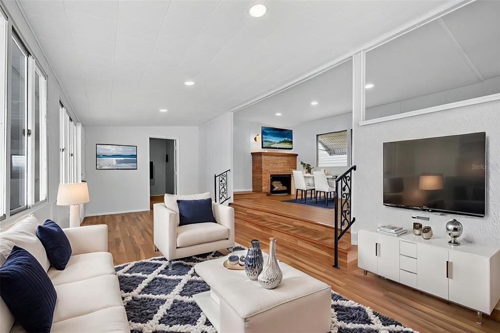 5162 Boca Raton Avenue Sarasota, FL 34234 - Photo 6 of 42 a living room with furniture and a flat screen tv