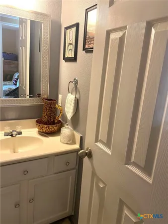 a bathroom with a sink a toilet and a bathtub