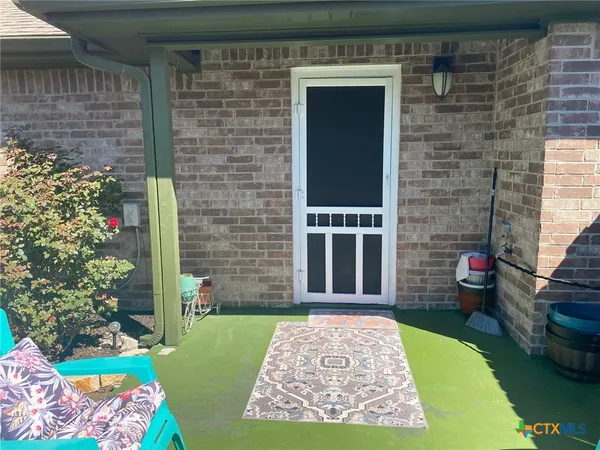 a view of back yard with green space