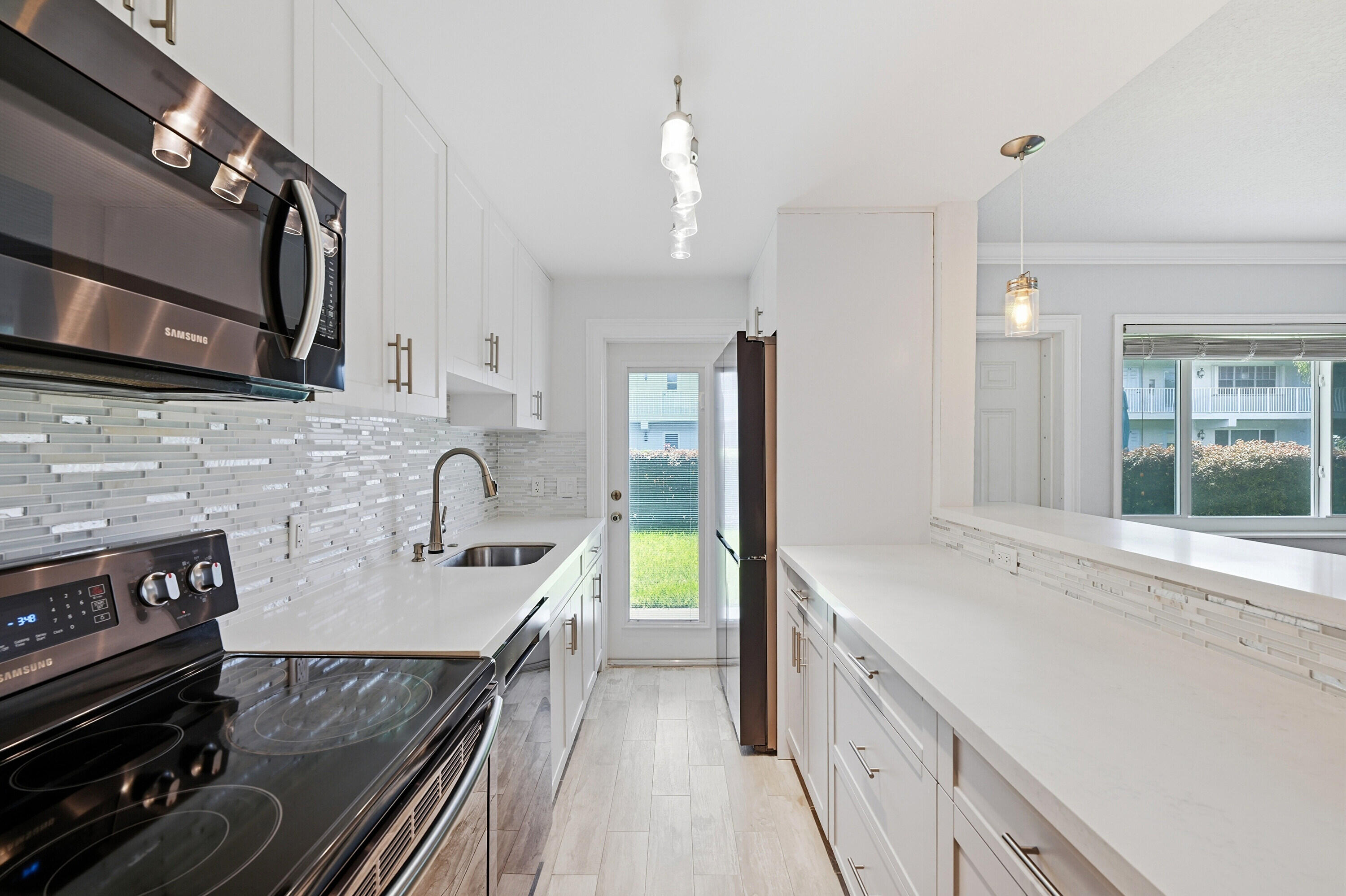 2110 Northeast 42nd Street, Unit 2B Lighthouse Point, FL 33064 - Photo 1 of 31 Kitchen