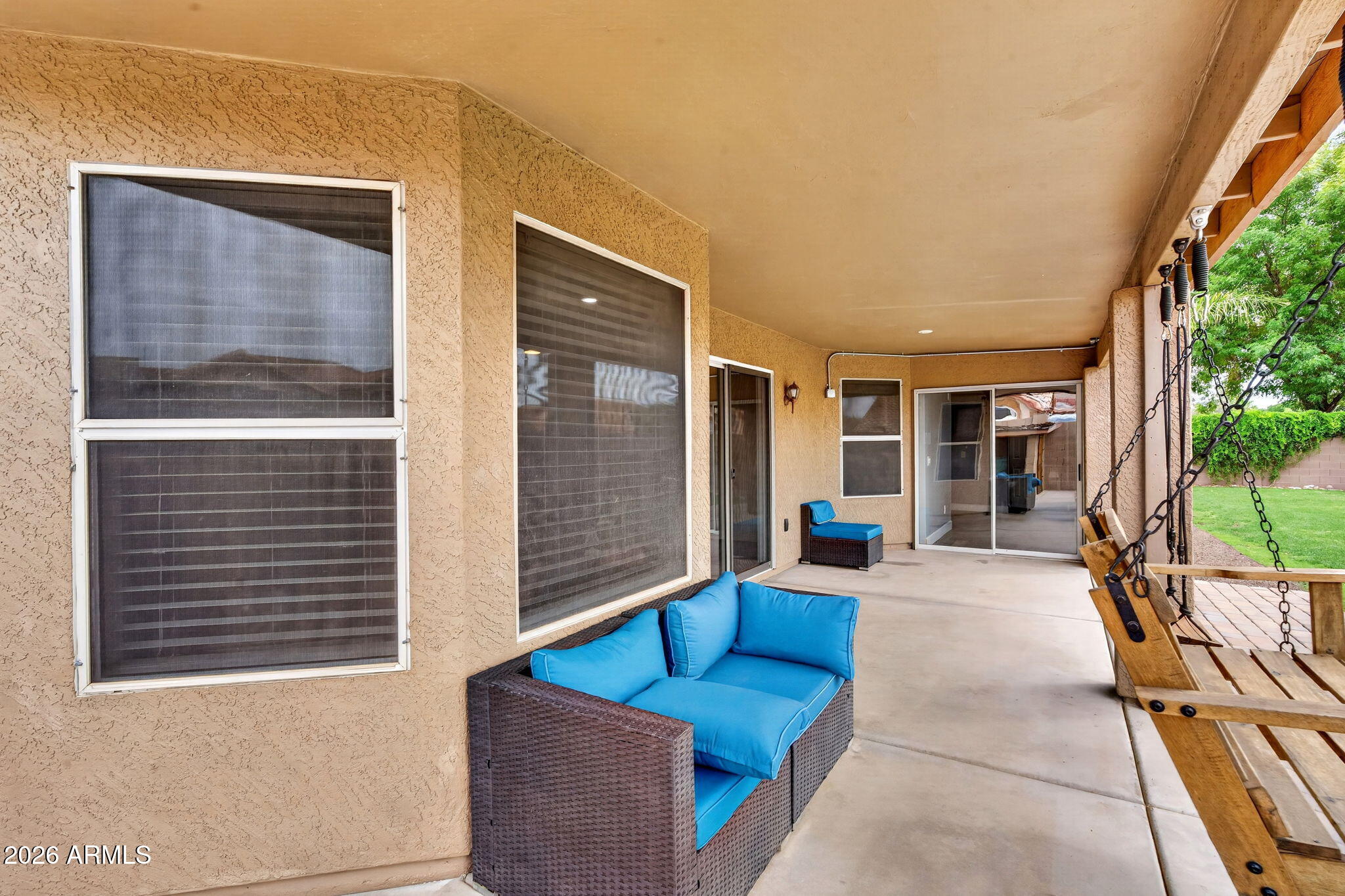 3242 North Ricardo Circle Mesa, AZ 85215 - Photo 52 of 79 a view of a patio with table and chairs and potted plants