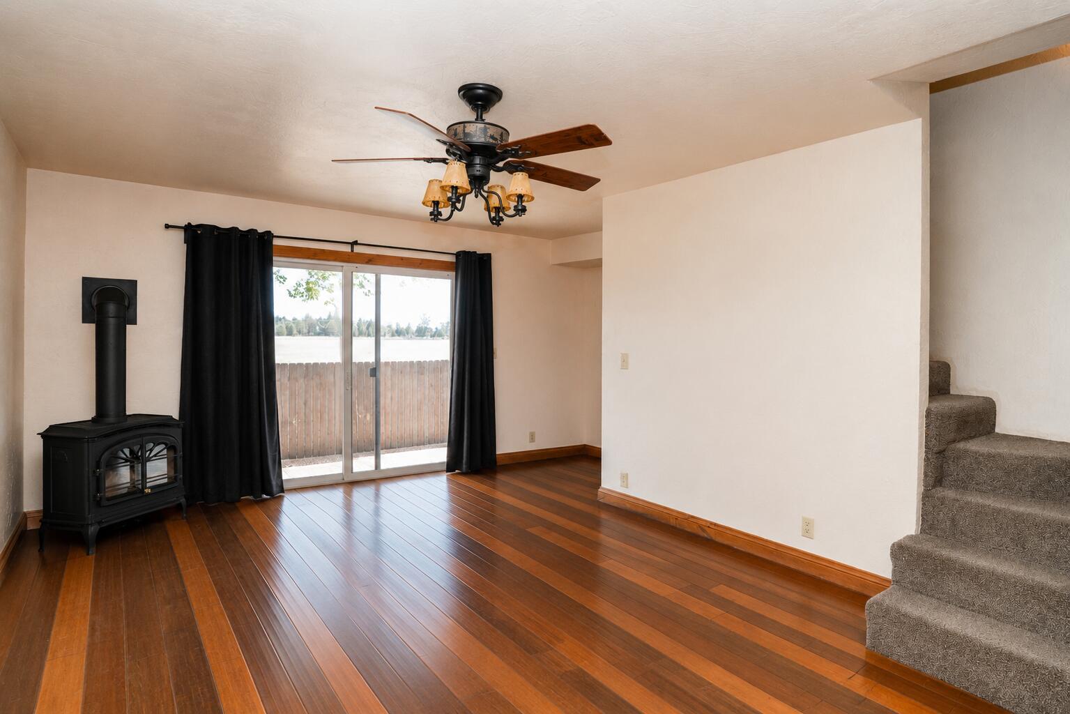 26695 Horsell Road Bend, OR 97701 - Photo 18 of 33 a view of an entryway with wooden floor and windows