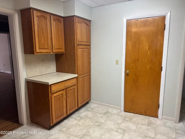 a utility room with washer and dryer