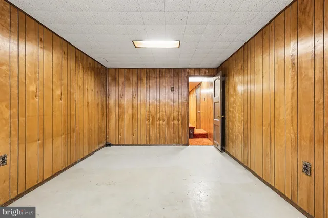a view of a room with large windows