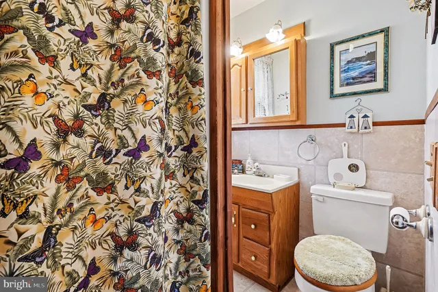 a bathroom with a toilet and a sink