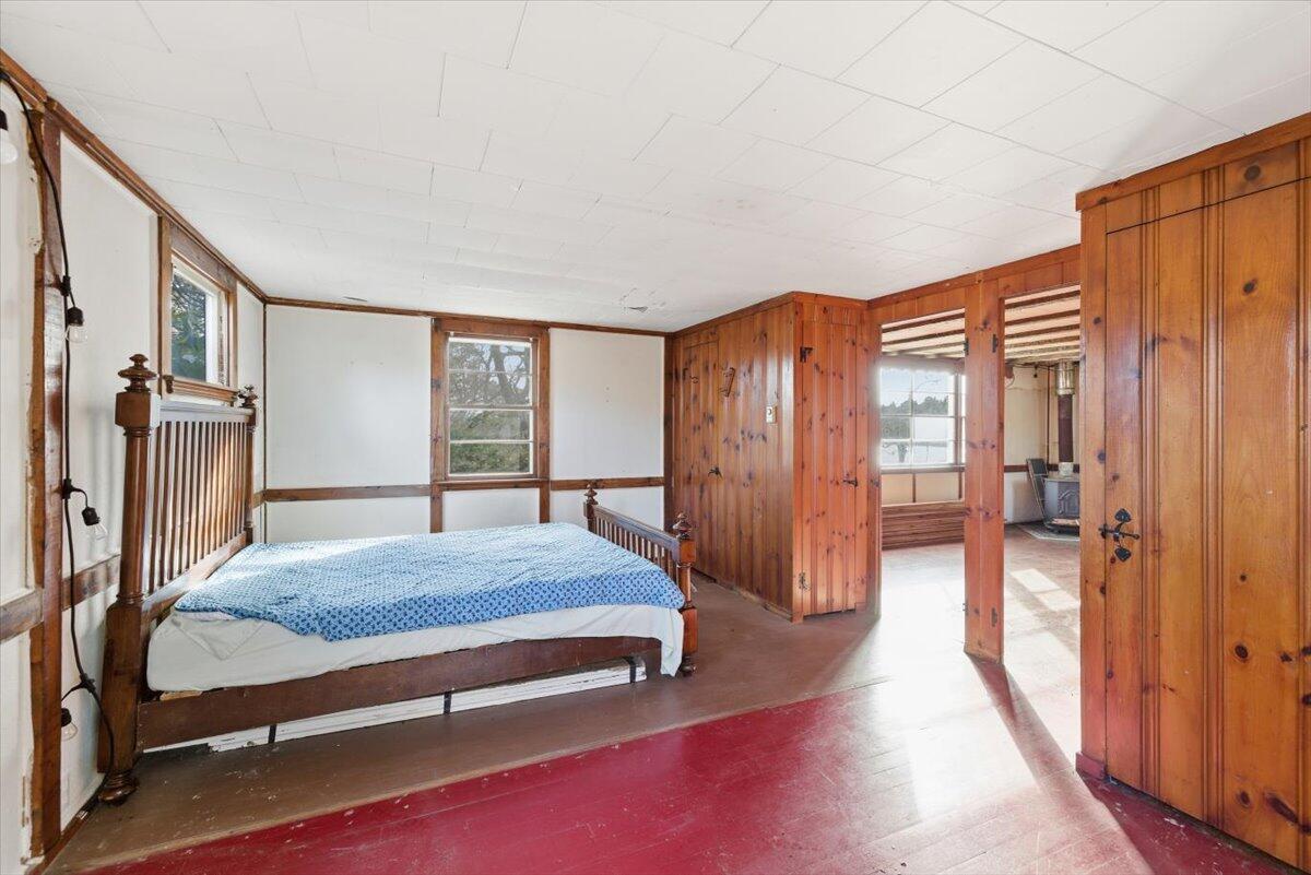 53 Carter's Bridge Road Plymouth, MA 02360 - Photo 21 of 30 a bedroom with a bed closet and a large mirror