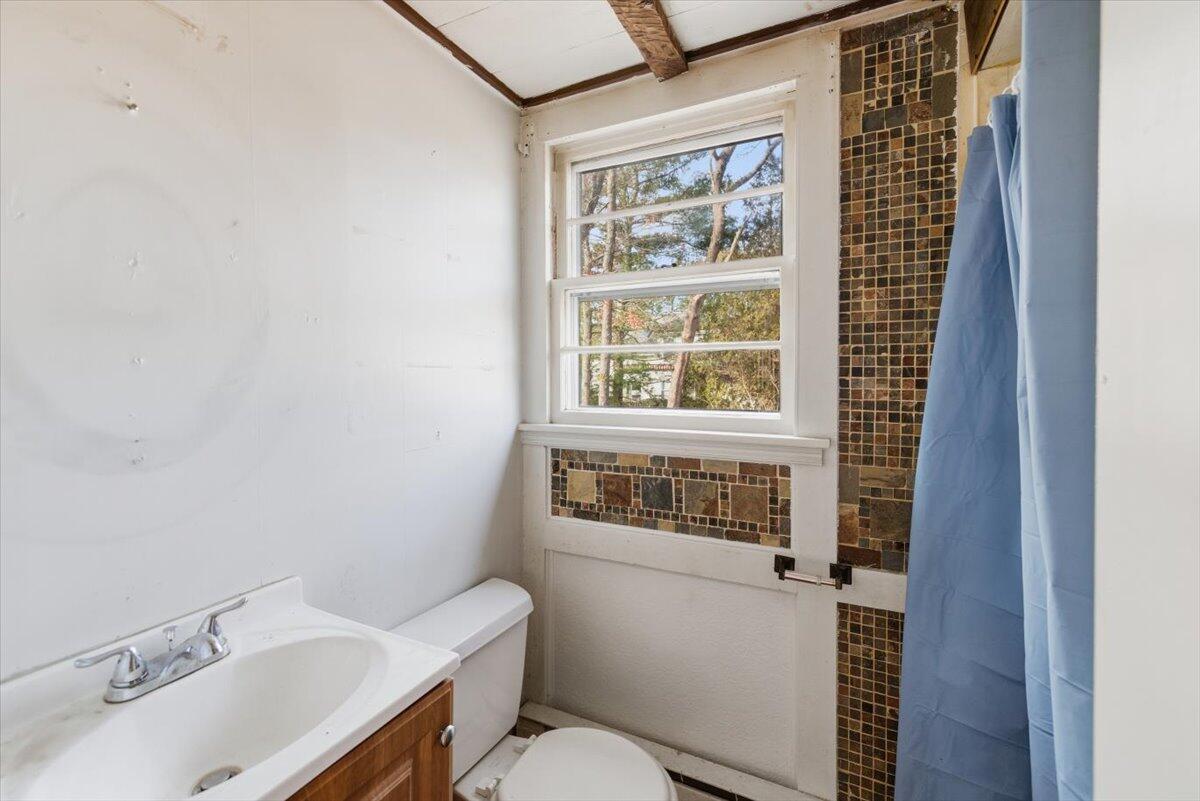 53 Carter's Bridge Road Plymouth, MA 02360 - Photo 23 of 30 a bathroom with a sink and a toilet