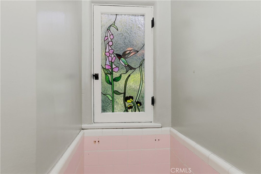 4579 University Riverside, CA 92501 - Photo 24 of 44 Stain glass window in downatairs bath