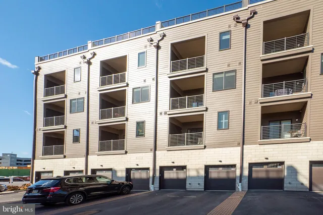a front view of a building with glass windows