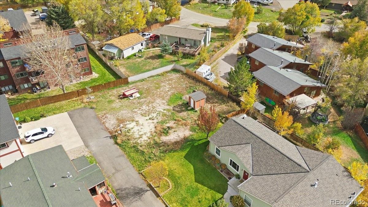 378 Blacksmith Road Eagle, CO 81631 - Photo 3 of 14 an aerial view of a house with a yard