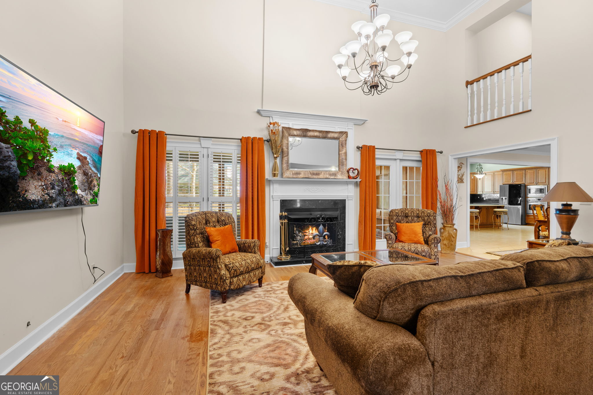 109 Crest Pointe Warner Robins, GA 31088 - Photo 11 of 86 a living room with furniture fireplace and a large window