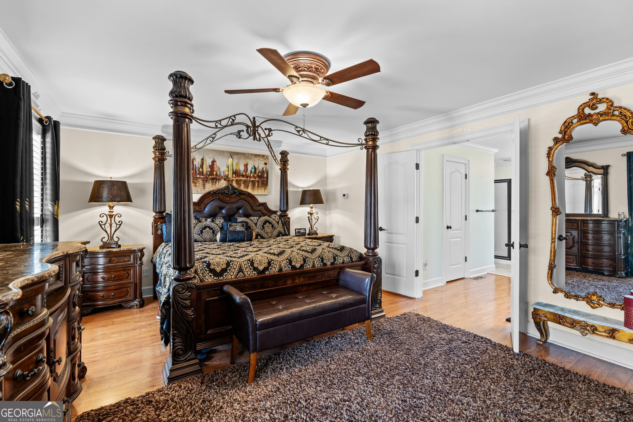 109 Crest Pointe Warner Robins, GA 31088 - Photo 32 of 86 a bedroom with furniture and a chandelier