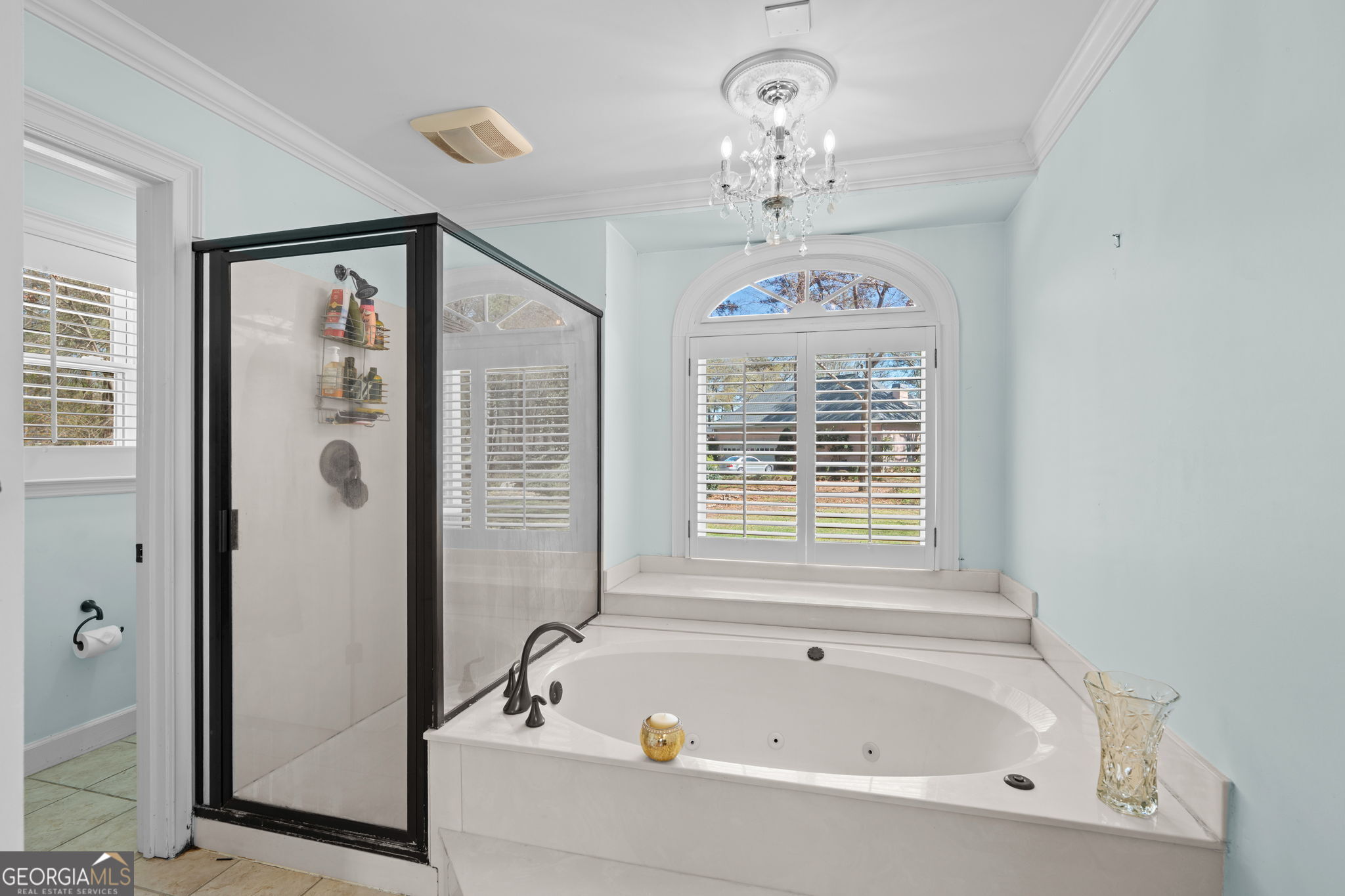 109 Crest Pointe Warner Robins, GA 31088 - Photo 38 of 86 a bathroom with a bathtub a window and a shower