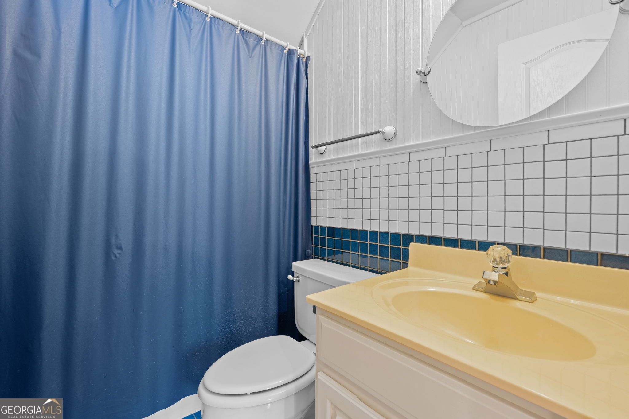 109 Crest Pointe Warner Robins, GA 31088 - Photo 71 of 86 a bathroom with a sink a toilet and mirror