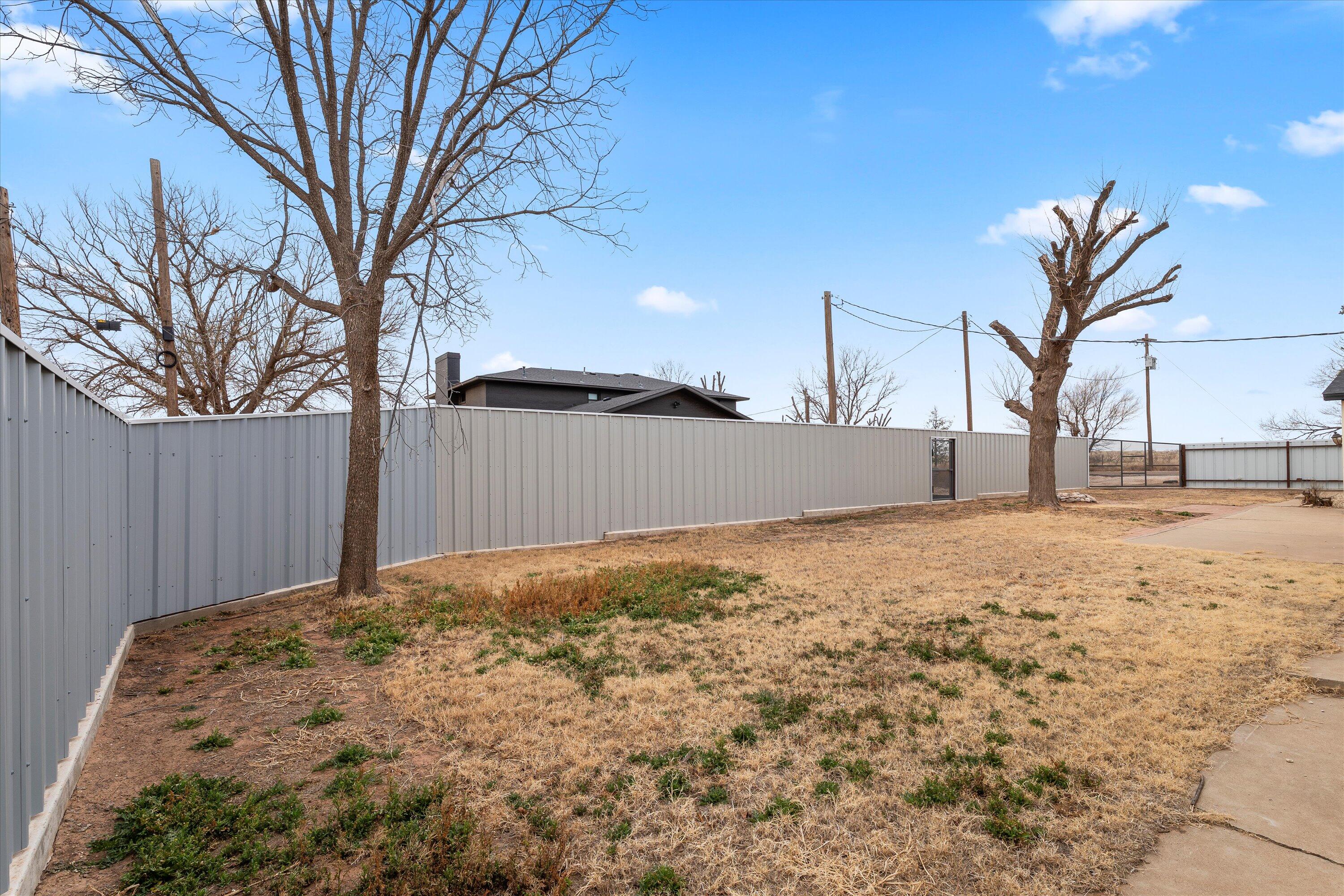 102 3rd Street Plains, TX 79355 - Photo 10 of 29 a backyard of a house