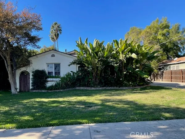 a view of a house with a swimming pool