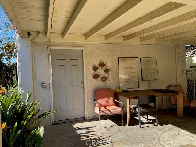 a view of a room with wooden walls