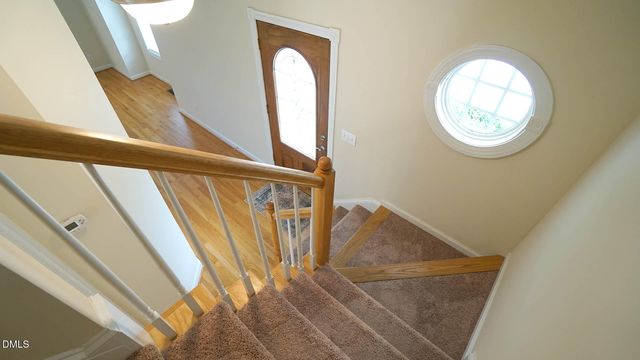 a view of staircase with large window