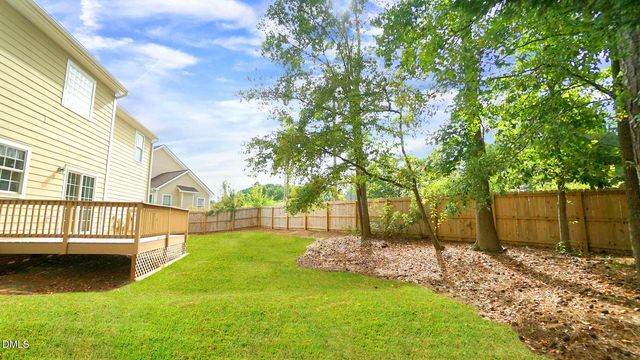 a view of a garden with a bench