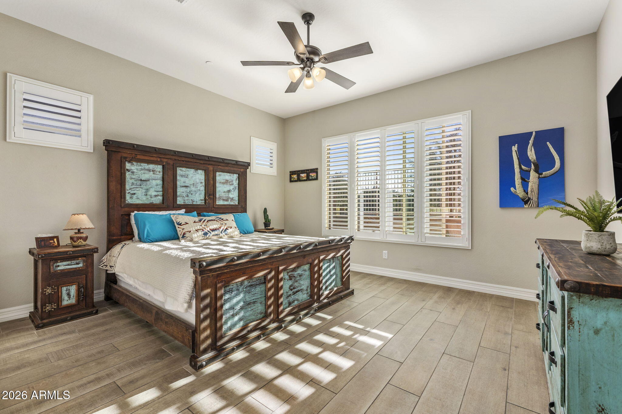 18785 East Blue Sky Drive Rio Verde, AZ 85263 - Photo 12 of 23 a spacious bedroom with a bed and a table in it