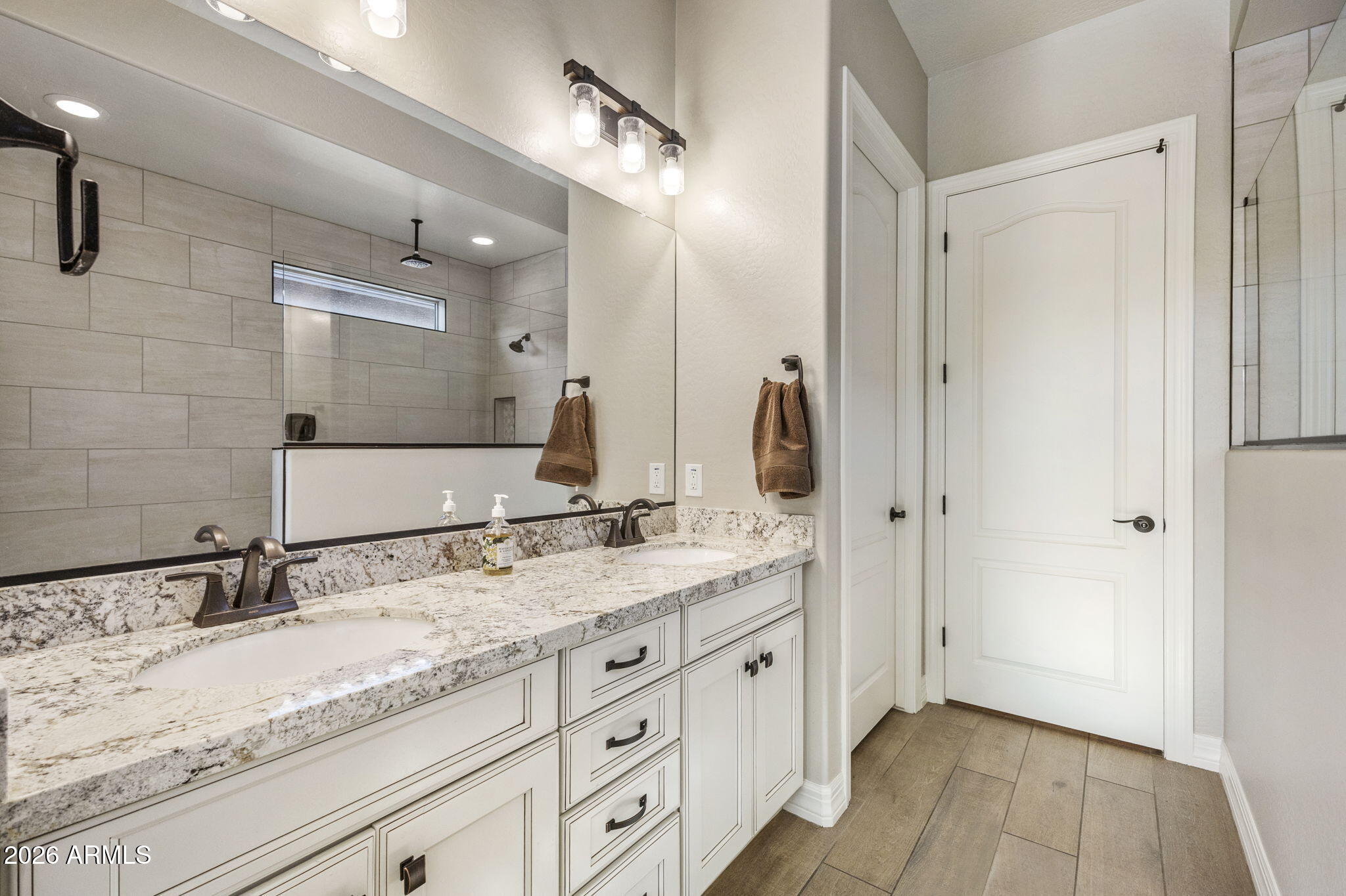 18785 East Blue Sky Drive Rio Verde, AZ 85263 - Photo 13 of 23 a bathroom with a granite countertop sink mirror and double