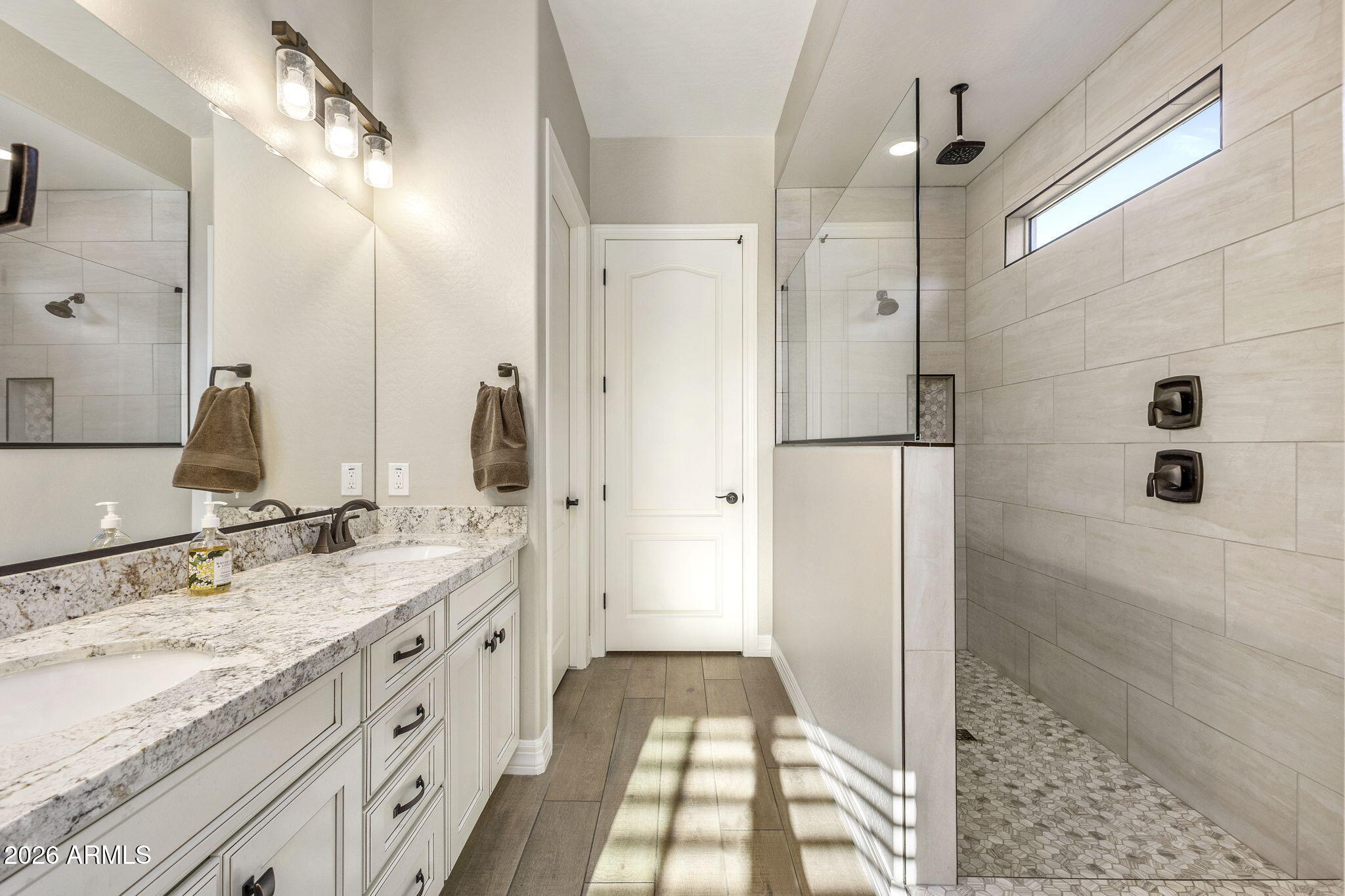 18785 East Blue Sky Drive Rio Verde, AZ 85263 - Photo 14 of 23 a bathroom with a granite countertop sink mirror and shower