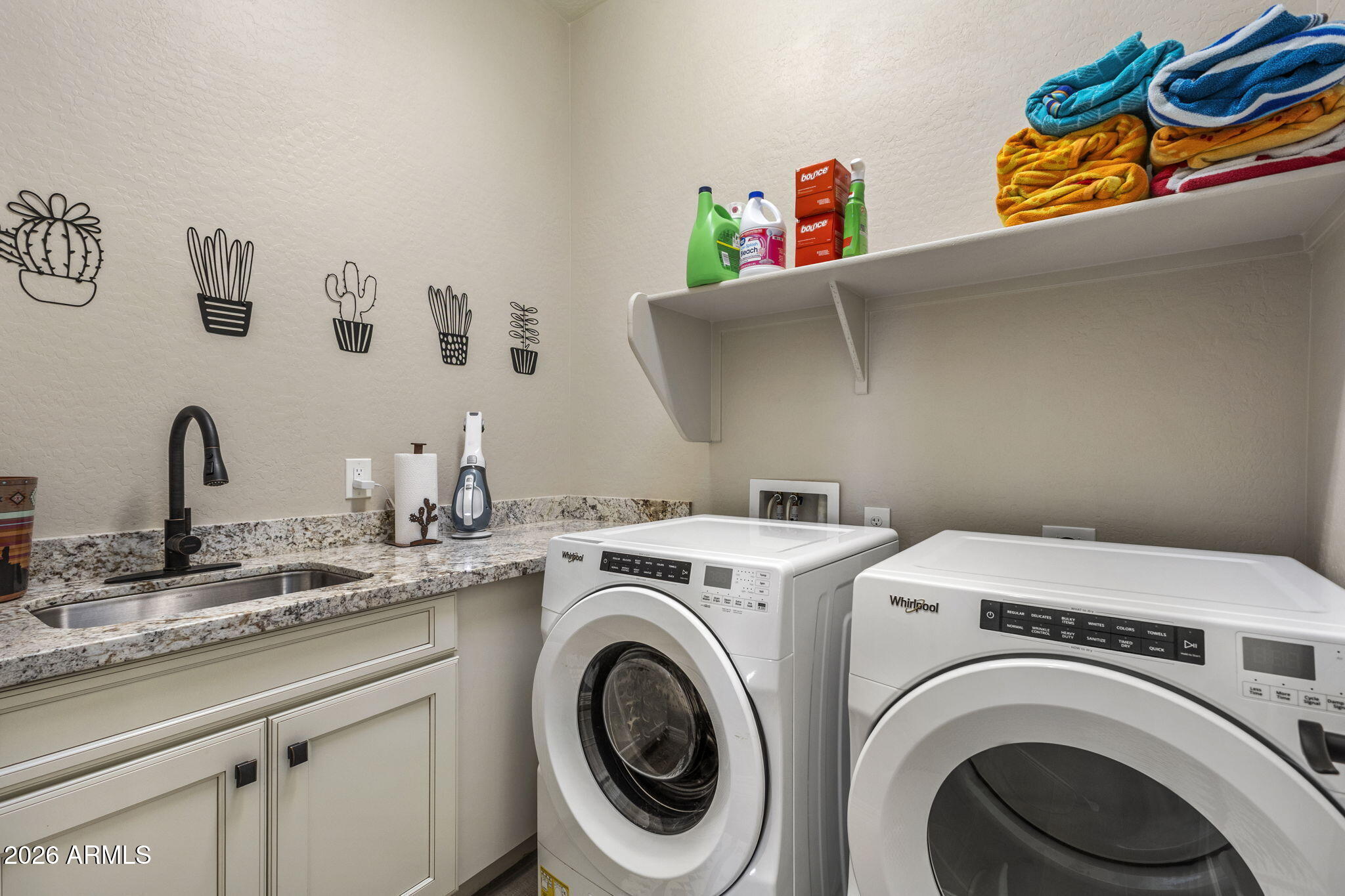 18785 East Blue Sky Drive Rio Verde, AZ 85263 - Photo 16 of 23 a utility room with dryer and washer