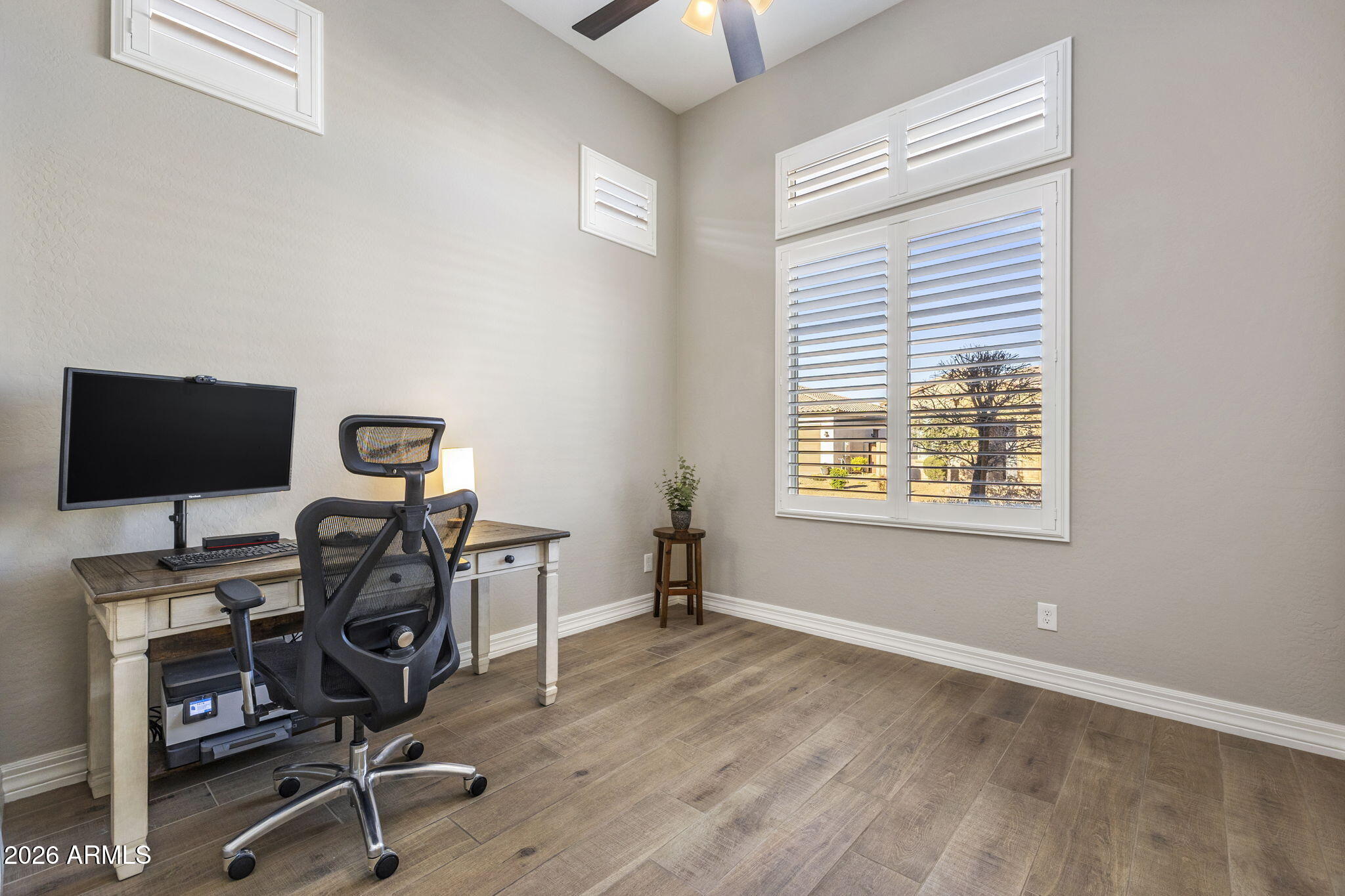 18785 East Blue Sky Drive Rio Verde, AZ 85263 - Photo 10 of 23 a view of a workspace with furniture and a window