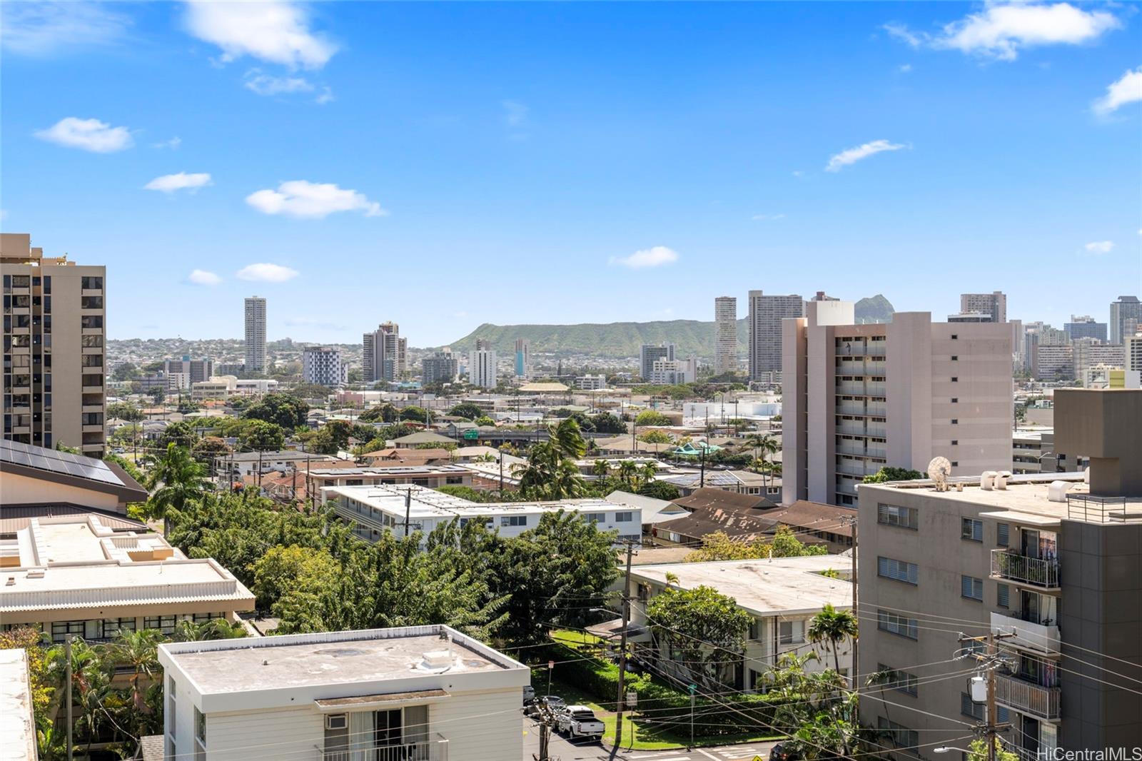 1624 Dole Street, Unit 801 Honolulu, HI 96822 - Photo 17 of 20 a city view with tall buildings