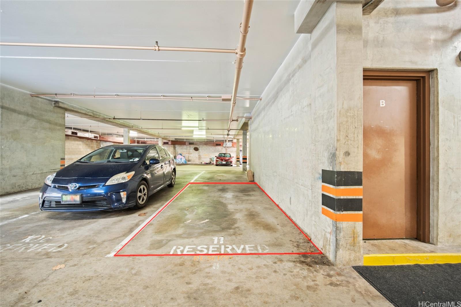 1624 Dole Street, Unit 801 Honolulu, HI 96822 - Photo 19 of 20 a view of car parked in garage
