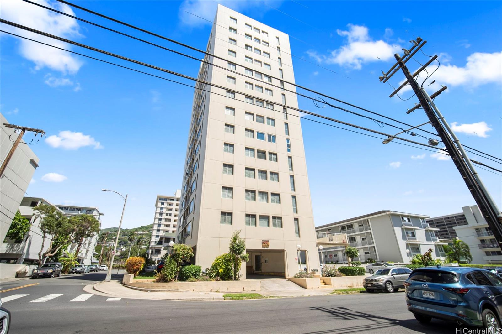 1624 Dole Street, Unit 801 Honolulu, HI 96822 - Photo 20 of 20 a city street lined with tall buildings