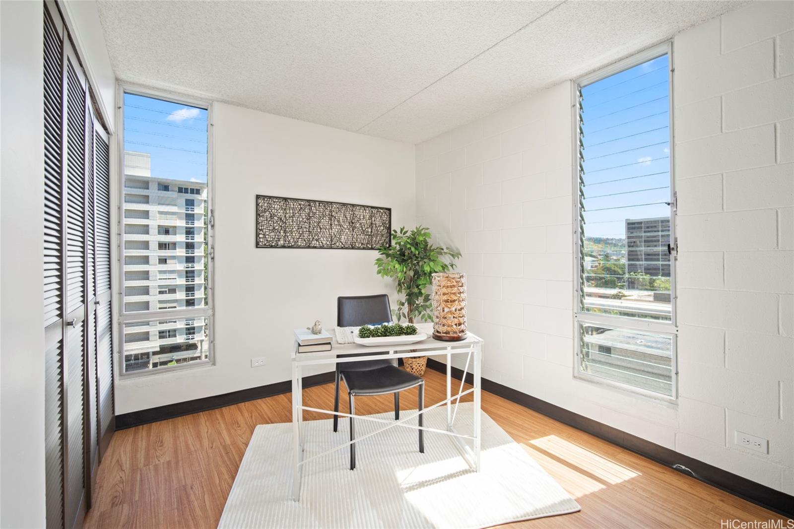 1624 Dole Street, Unit 801 Honolulu, HI 96822 - Photo 8 of 20 a workspace with furniture and a window