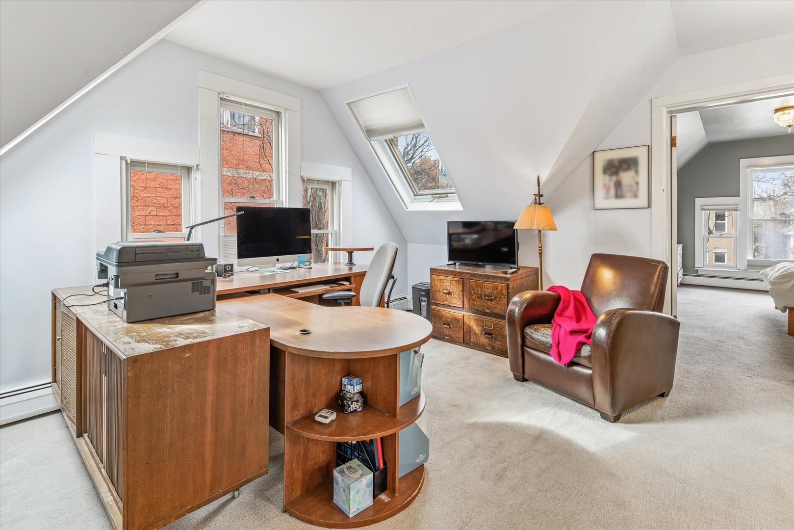 3135 North Seminary Avenue, Unit 1 Chicago, IL 60657 - Photo 11 of 18 a living room with furniture and a flat screen tv
