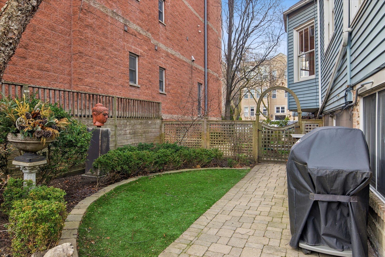 3135 North Seminary Avenue, Unit 1 Chicago, IL 60657 - Photo 15 of 18 a view of backyard with outdoor seating and green space