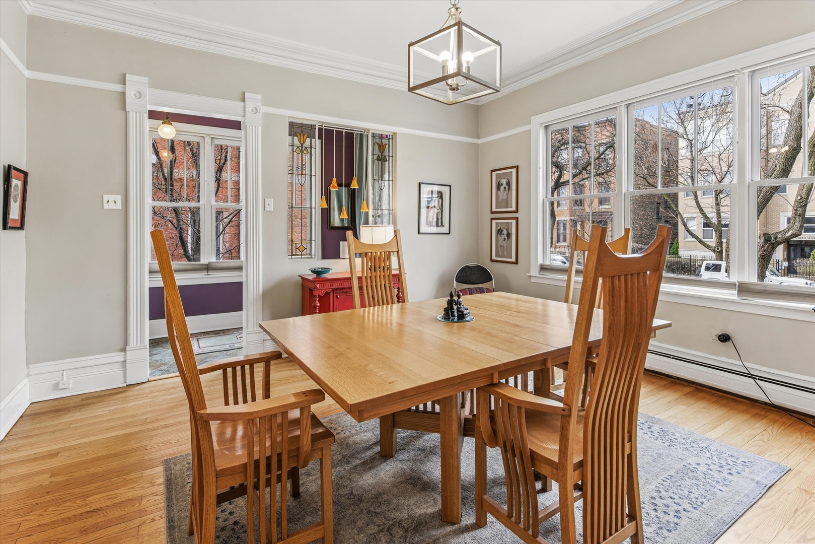 3135 North Seminary Avenue, Unit 1 Chicago, IL 60657 - Photo 2 of 18 a view of a dining room with furniture window and wooden floor