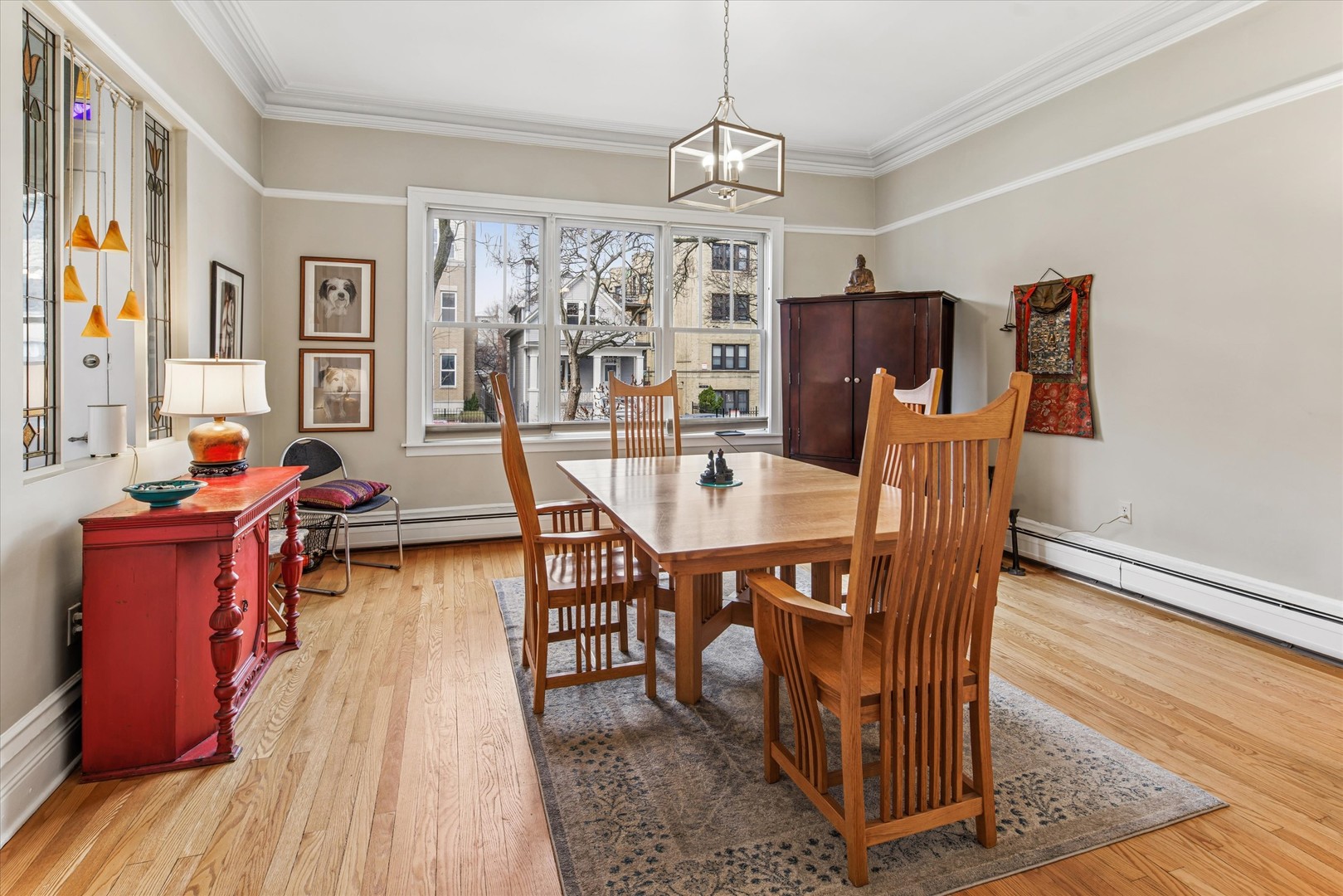 3135 North Seminary Avenue, Unit 1 Chicago, IL 60657 - Photo 3 of 18 a view of a dining room with furniture window and wooden floor