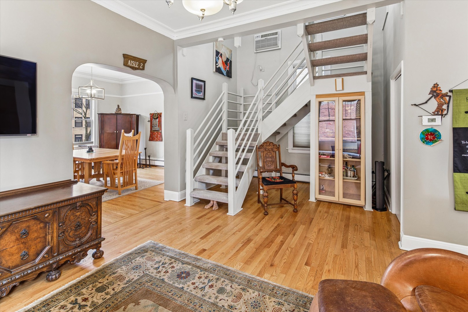 3135 North Seminary Avenue, Unit 1 Chicago, IL 60657 - Photo 4 of 18 a living room with furniture and wooden floor