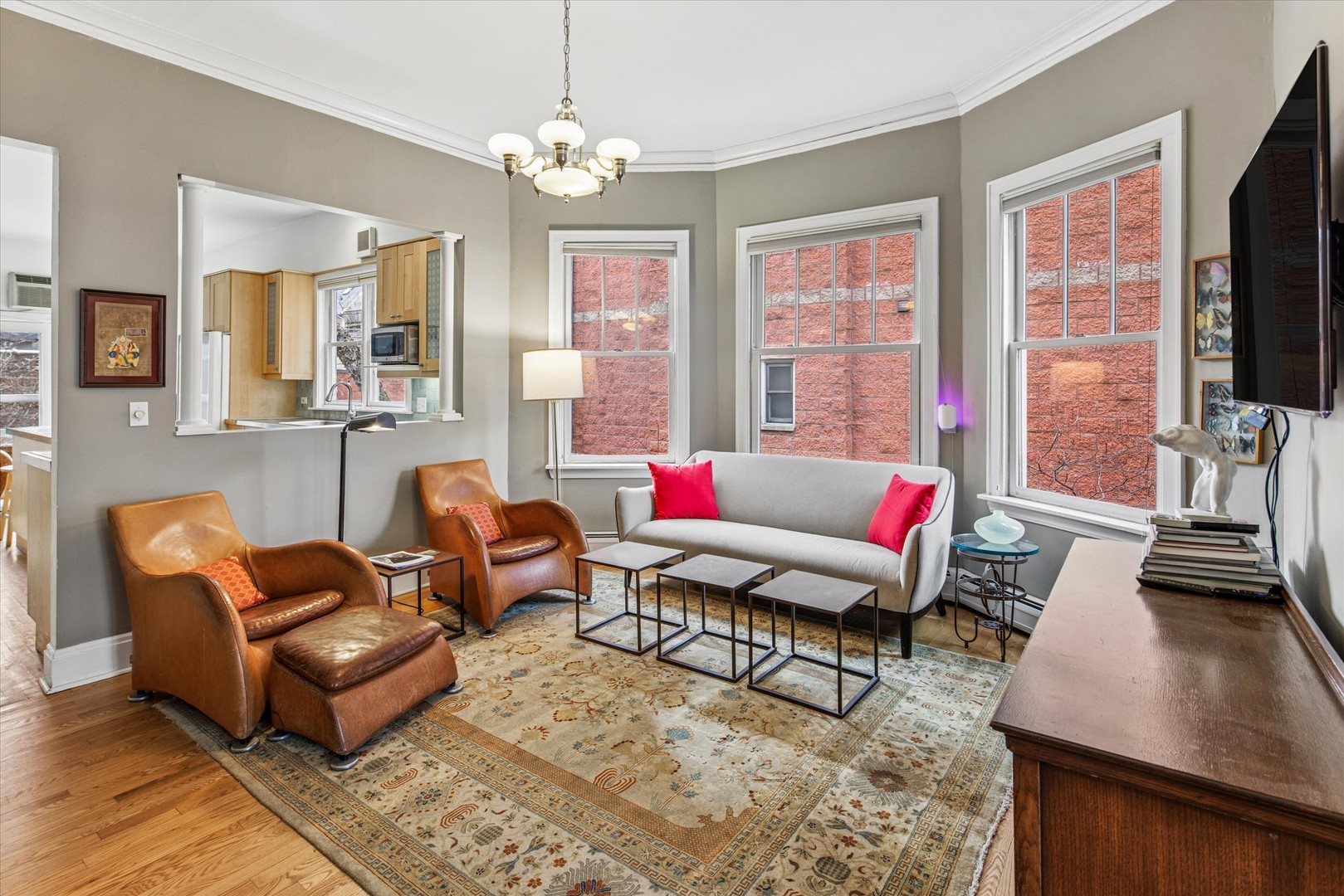 3135 North Seminary Avenue, Unit 1 Chicago, IL 60657 - Photo 5 of 18 a living room with furniture flat screen tv and window