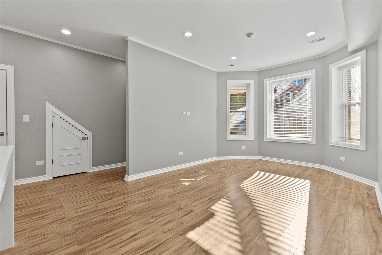 Undisclosed Address Chicago, IL 60614 - Photo 2 of 14 a view of an empty room with window and wooden floor