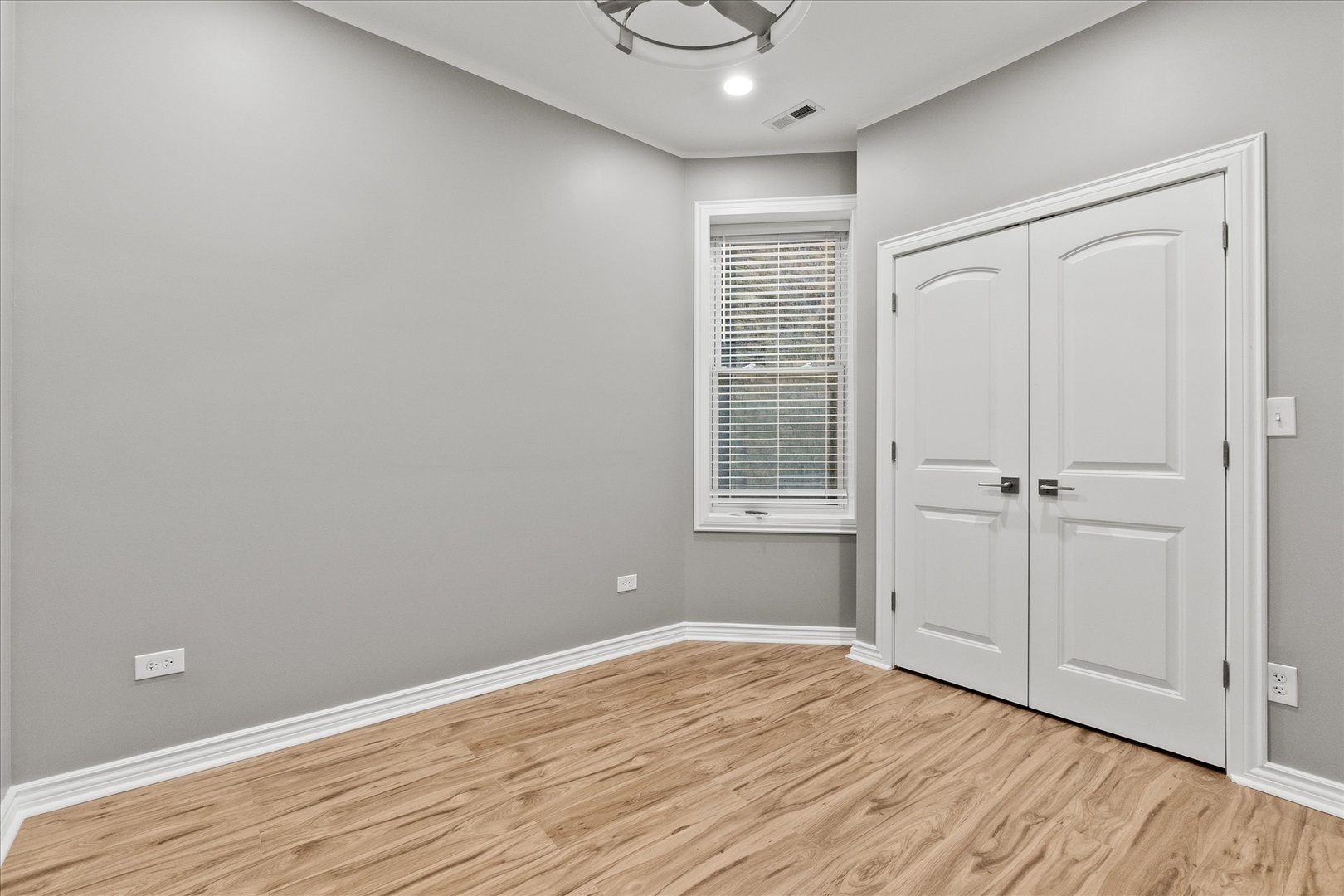 Undisclosed Address Chicago, IL 60614 - Photo 5 of 14 wooden floor in an empty room with a window